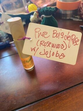 Brass Tone Roller Bottle with Yellow Label - Rosewood Jojoba